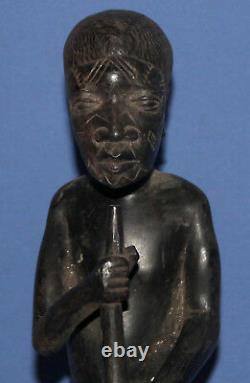 Vintage hand carved wood tribe man statuette