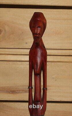 Vintage hand carving wood figurine tribal man