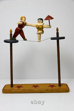 Wolf Creek Circus Folk Art Wood Carvings Tight Rope Couple. Artist Signed 1993