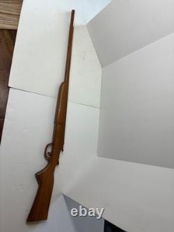 Wood carved single barrel shotgun approximately 40 inches long