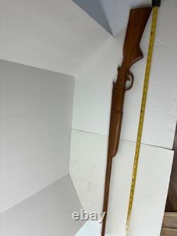 Wood carved single barrel shotgun approximately 40 inches long