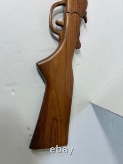 Wood carved single barrel shotgun approximately 40 inches long
