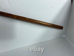 Wood carved single barrel shotgun approximately 40 inches long