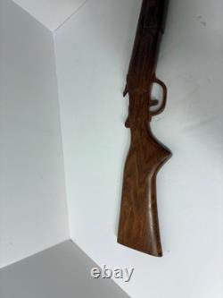 Wood carved single barrel shotgun approximately 40 inches long