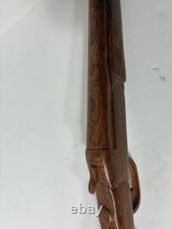 Wood carved single barrel shotgun approximately 40 inches long