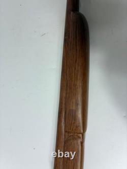 Wood carved single barrel shotgun approximately 40 inches long