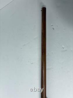 Wood carved single barrel shotgun approximately 40 inches long