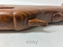 Wood carved single barrel shotgun approximately 40 inches long