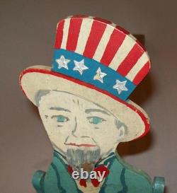 Antique vintage des années 1930, figure articulée en bois sculpté d’art populaire représentant l’Oncle Sam dansant, jigger