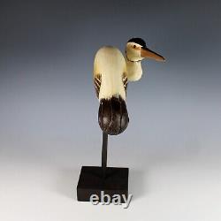 Art folklorique Oiseau de rivage sculpté en bois Héron avec yeux en verre
