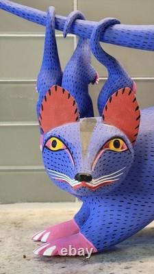 Art populaire de Oaxaca : sculpture sur bois de Moises Jimenez ? Mère opossum et bébés
