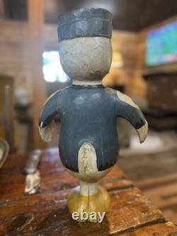 Art populaire primitif sculpture sur bois. Canard. Peint ancien.