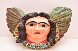 Artisanat populaire mexicain antique : Masque de putti ange en bois sculpté de Guerrero, signé.