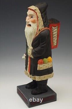 Artisanat traditionnel de Williamsburg colonial: Santa sculpté à la main en robe noire, 13 pouces Robb