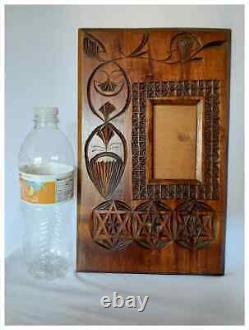 Cadre de miroir en bois sculpté en éclats d'art populaire antique