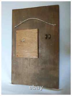 Cadre de miroir en bois sculpté en éclats d'art populaire antique