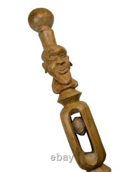 Canne en bois sculptée de l'art populaire américain ancien avec tête et boules captives doubles des années 1900