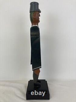 Charles Spiron Art populaire Sculpture sur bois Tourniquet Chef de train noir Daté de 1983