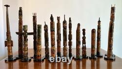 Collection de Totems Anciens en Bois Sculpté et Peints à la Main - Une Folklore Étonnante