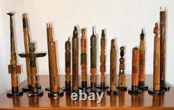 Collection de Totems Anciens en Bois Sculpté et Peints à la Main - Une Folklore Étonnante