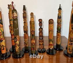 Collection de Totems Anciens en Bois Sculpté et Peints à la Main - Une Folklore Étonnante