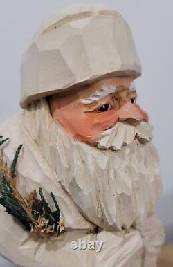 Figure en bois sculpté à la main du Père Noël, l'artiste Larry Heinen