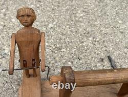 Figurine d'homme en bois sculpté de tourniquet antique, art populaire des années 1920-1940