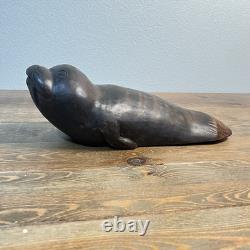 Figurine sceau vintage sculptée à la main en bois, art populaire, gousse de graine de tagua