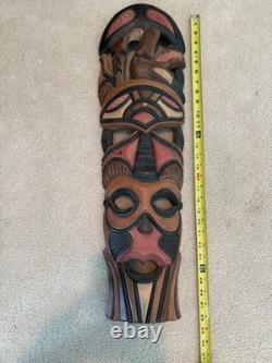 Grande paire de masques tribaux sud-africains vintage en bois sculpté à la main, 28 et 26, art populaire