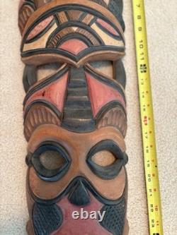Grande paire de masques tribaux sud-africains vintage en bois sculpté à la main, 28 et 26, art populaire
