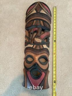 Grande paire de masques tribaux sud-africains vintage en bois sculpté à la main, 28 et 26, art populaire