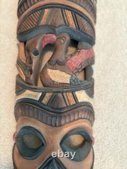 Grande paire de masques tribaux sud-africains vintage en bois sculpté à la main, 28 et 26, art populaire