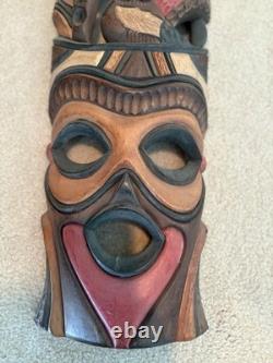 Grande paire de masques tribaux sud-africains vintage en bois sculpté à la main, 28 et 26, art populaire