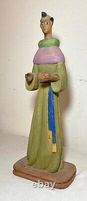 Grande sculpture religieuse en bois peint à la main, d'art populaire ancien et authentique des saints Santos.