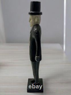 Homme en bois de l'art folklorique américain. Bras mobiles.