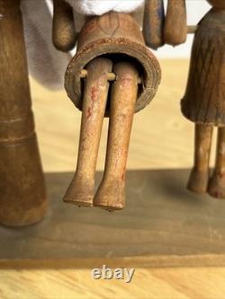 Jouet de trapèze pour enfants en art populaire américain, sculpté à la main et ancien