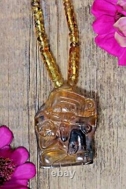 Le fardeau du temps Collier maya en ambre doré sculpté à la main Chiapas Art populaire mexicain