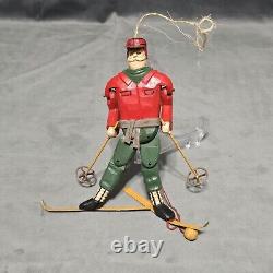 Marionnette de skieur sculptée à la main en art populaire, figure ornementale de ski de montagne