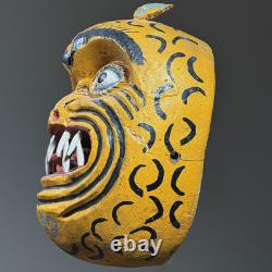 Masque de tigre polychrome en bois sculpté à la main de l'Oaxaca