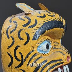 Masque de tigre polychrome en bois sculpté à la main de l'Oaxaca