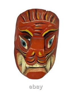 Masque en bois sculpté à la main, ancien et antique, art populaire mexicain sud-américain.