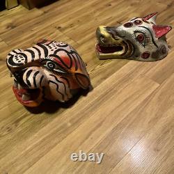 Masques de jaguar et de loup sculptés en art populaire mexicain