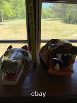 Masques de jaguar et de loup sculptés en art populaire mexicain