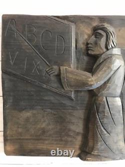 Plaque en relief en bois sculpté d'art populaire ancien, enseignant et étudiant, primitif