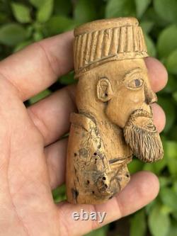 Poignée de canne et art populaire et bois sculpté