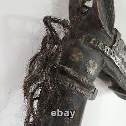 Poupée festive en bois sculpté de cheval à bascule d'art populaire africain du Mali