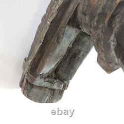 Poupée festive en bois sculpté de cheval à bascule d'art populaire africain du Mali