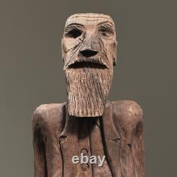 Sculpture d'art populaire en bois sculpté à la main d'un homme barbu antique