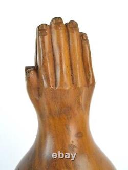 Sculpture de tirelire en bois de chêne sculpté vintage avec des mains priantes d'art populaire.