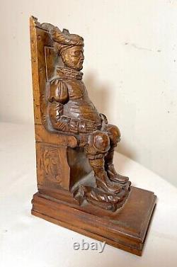 Sculpture en bois antique sculptée à la main représentant un homme assis, figuratif, de style folklorique